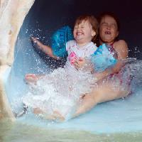 Pixwords The image with kids, water, slide, waterslide, summer Rozenn Leard - Dreamstime