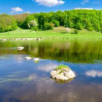 Pixwords The image with water, green, lake, forest, rock, sky, clouds Oleksandr Kalyna (Alexkalina)
