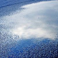 Pixwords The image with water, asphalt, sky, reflection, road Bellemedia - Dreamstime