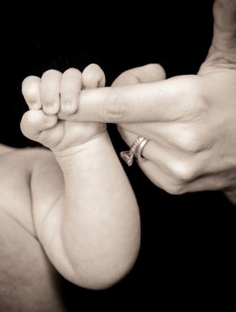 hand, baby, ring, hold Sarah Spencer - Dreamstime