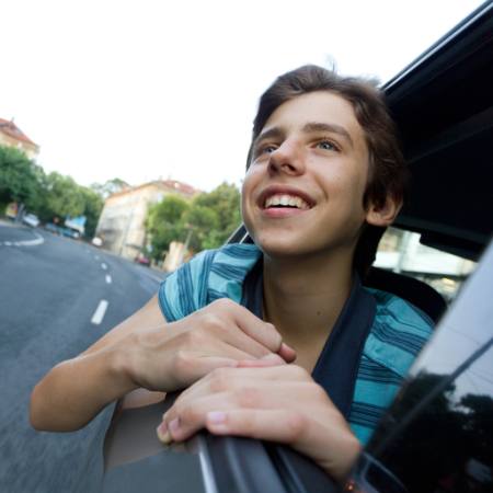car, window, boy, road, smile Grisho - Dreamstime
