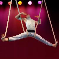 Pixwords The image with man, hanging, circus, red, strings Galina Barskaya - Dreamstime