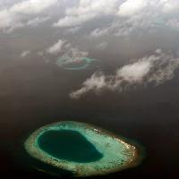 Pixwords The image with landscape, water, reef, coral, clouds, green Albo