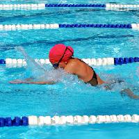Pixwords The image with swim, swimmer, red, head, woman, sport, water Jdgrant