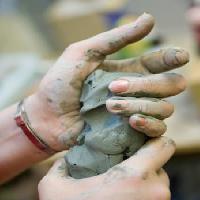 Pixwords The image with build, hands, mud Aleksander Chernuho - Dreamstime