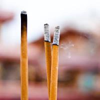 Pixwords The image with stick, smoke Boonyaruk Mung-on - Dreamstime