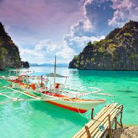 Pixwords The image with beach, water, nature, ocean, sea, clouds, mountain, mountains, island, boat, dock Olga Khoroshunova (Goodolga)