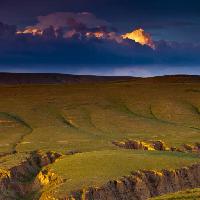 Pixwords The image with sky, clouds, nightfall, land, landscape, grass, nature Bjmcse