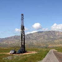 Pixwords The image with tower, car, nature, mountain, mountains, road, truck Rancho