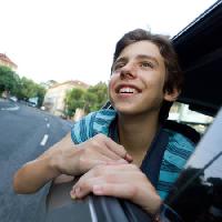 car, window, boy, road, smile Grisho - Dreamstime