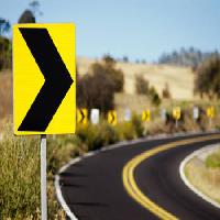 Pixwords The image with road, sign, danger, curve, right Agcuesta - Dreamstime
