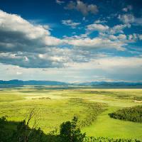 sky, nature, field, green, grass, clouds John De Bord - Dreamstime