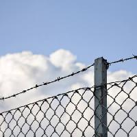 Pixwords The image with fence, clouds, sky, wire, pole Daniel Sanchez Blasco - Dreamstime